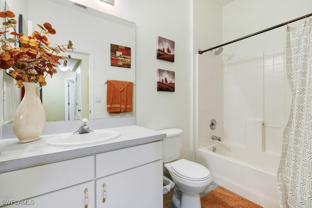 full bathroom with shower / bath combination with curtain, vanity, and toilet