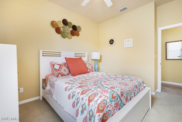 bedroom featuring ceiling fan and light colored carpet