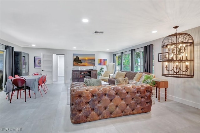 living room featuring a chandelier