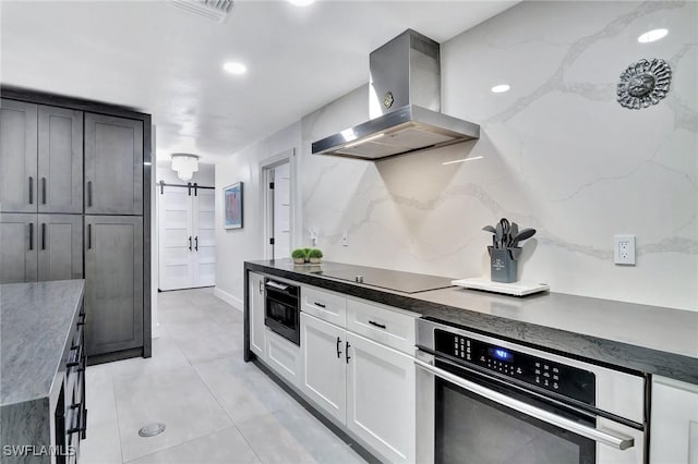 kitchen featuring white cabinets, oven, black electric stovetop, decorative backsplash, and extractor fan