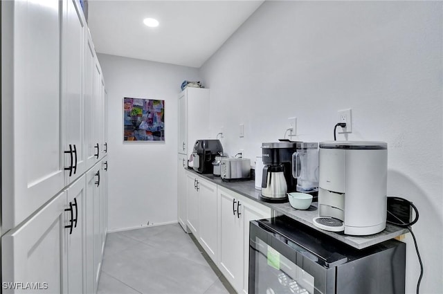 bar with white cabinetry