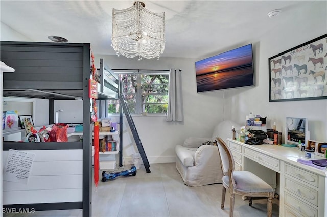 bedroom featuring a chandelier