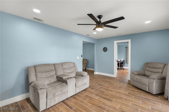 living room featuring ceiling fan