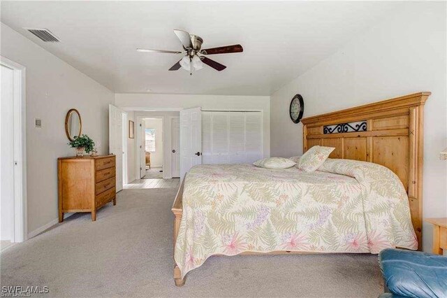 15188 Sam Snead Ln, North Fort Myers, FL 33917 - bedroom featuring ceiling fan, light carpet, and visible vents