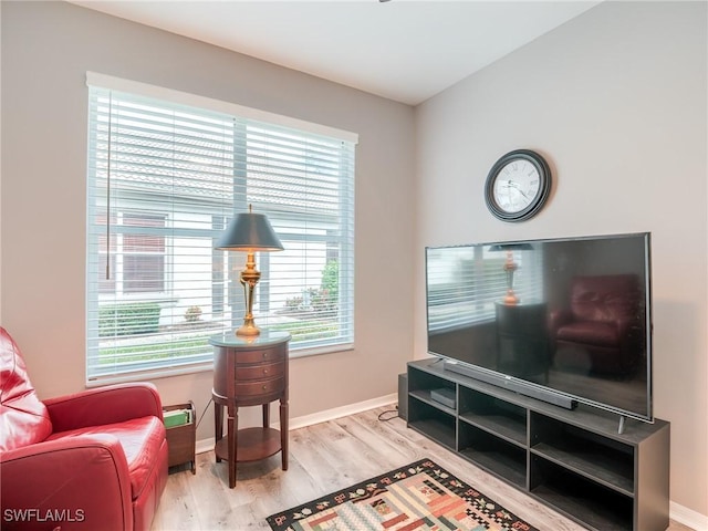 sitting room featuring light hardwood / wood-style floors