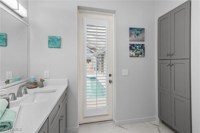 bathroom featuring vanity and plenty of natural light