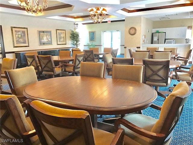 dining area featuring beam ceiling, a notable chandelier, and coffered ceiling