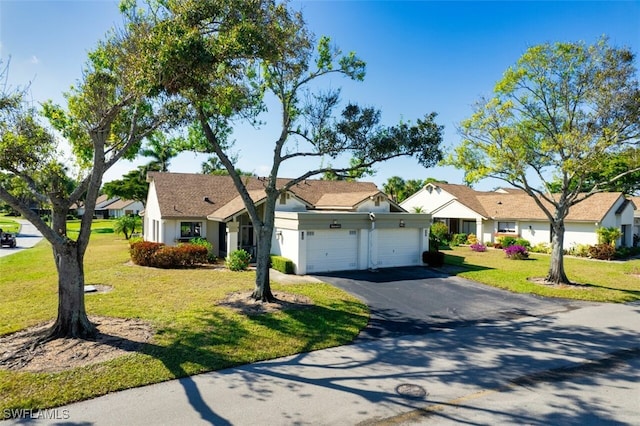 single story home with a garage and a front lawn