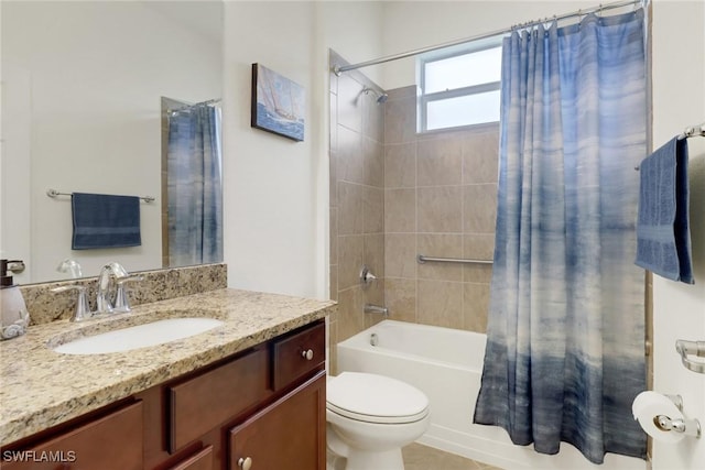 full bathroom featuring shower / bath combination with curtain, vanity, and toilet