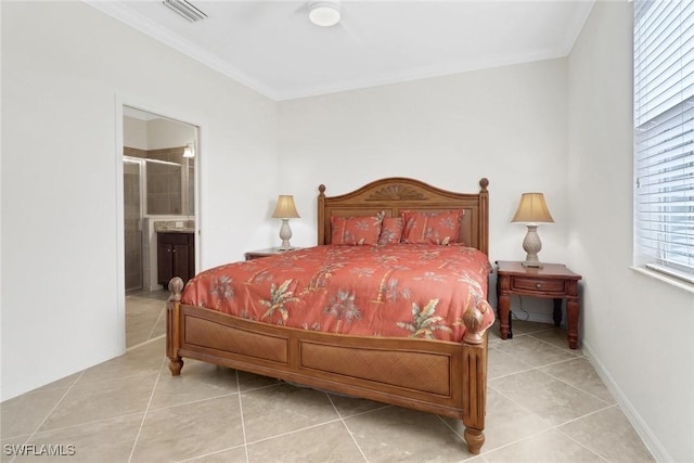 tiled bedroom with ensuite bath and ceiling fan