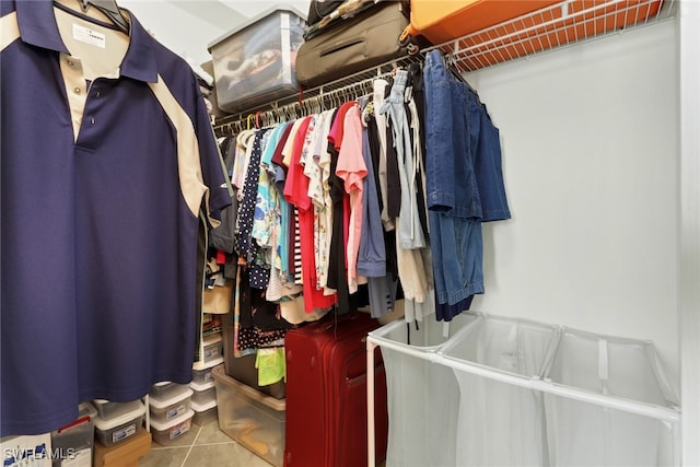 spacious closet featuring tile patterned floors