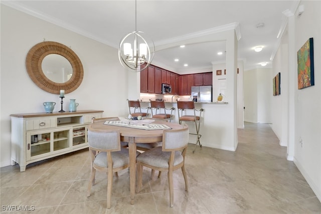 dining area featuring ornamental molding, light tile patterned floors, and an inviting chandelier