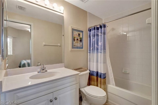 full bathroom with toilet, vanity, and shower / tub combo with curtain