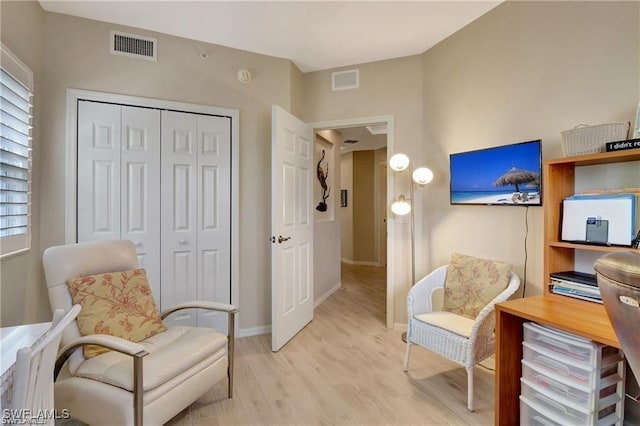 living area with light wood-type flooring