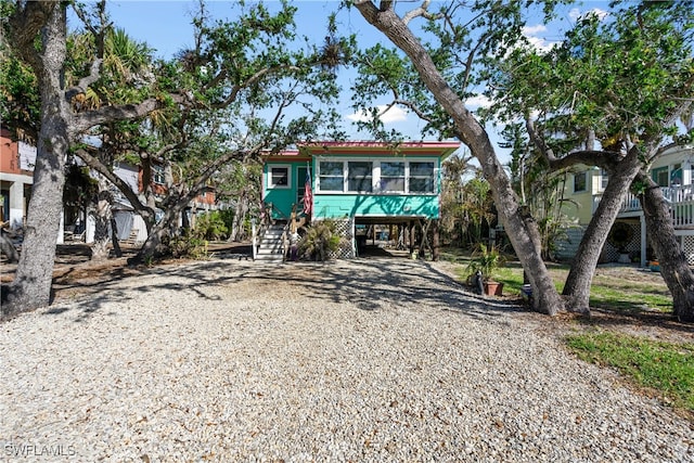 view of front of house featuring a carport