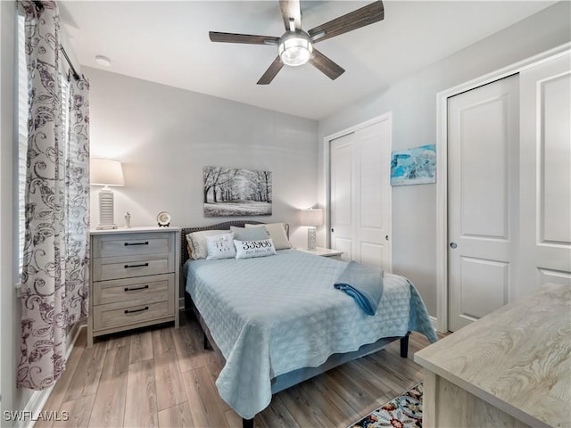 bedroom featuring ceiling fan and light wood-type flooring