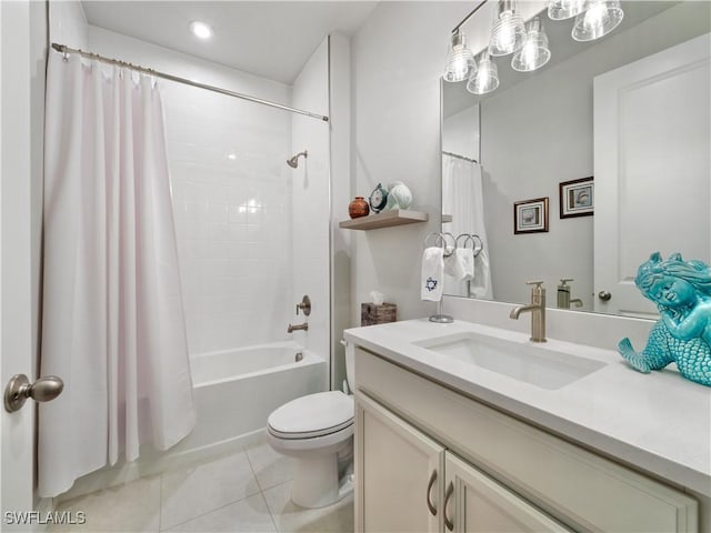 full bathroom featuring tile patterned flooring, vanity, shower / bath combination with curtain, and toilet