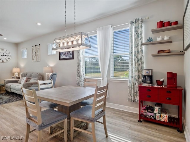 dining area with light wood-type flooring