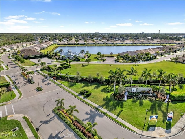 drone / aerial view with a water view