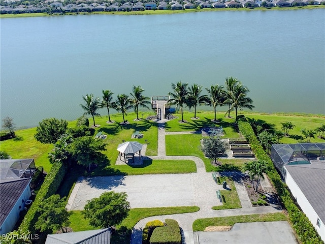 birds eye view of property featuring a water view