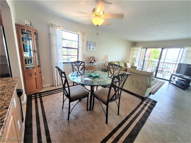 dining area featuring ceiling fan