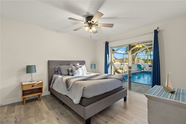 bedroom with access to exterior, light hardwood / wood-style flooring, and ceiling fan