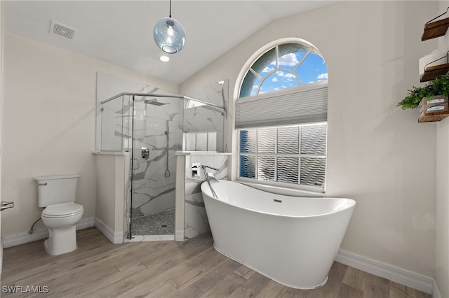 bathroom with separate shower and tub, wood-type flooring, lofted ceiling, and toilet