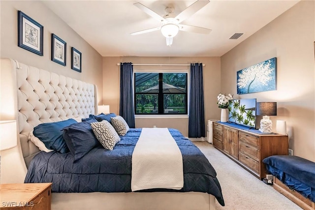 carpeted bedroom featuring ceiling fan