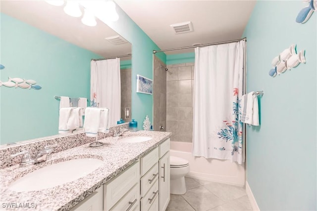 full bathroom featuring tile patterned flooring, vanity, toilet, and shower / bathtub combination with curtain