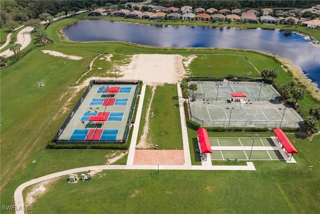 bird's eye view with a water view