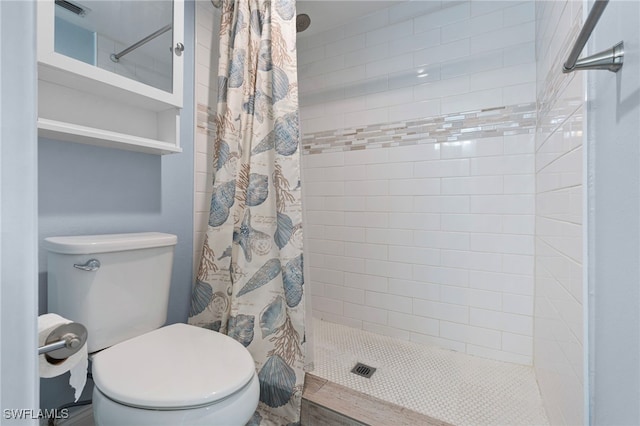 bathroom with toilet and walk in shower