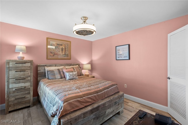 bedroom with light wood-type flooring