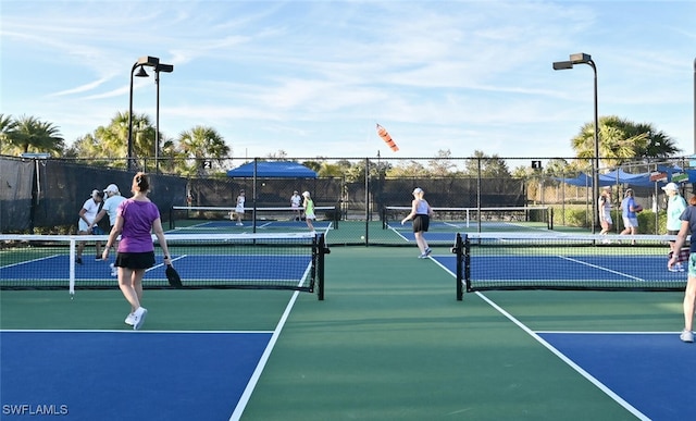 view of tennis court with basketball court