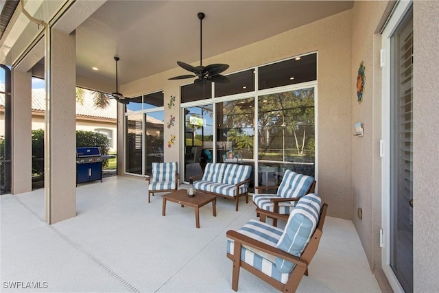 view of patio featuring ceiling fan and outdoor lounge area