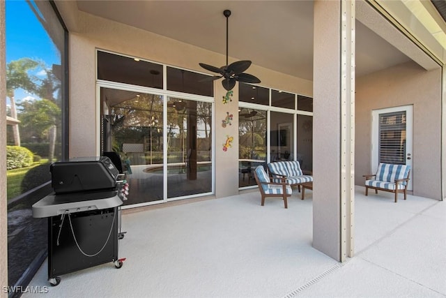 view of patio with grilling area and ceiling fan