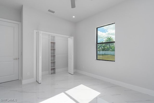 unfurnished bedroom featuring a closet and ceiling fan