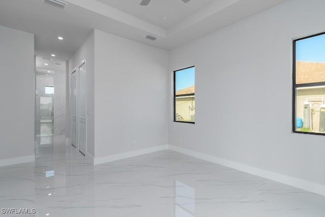 spare room featuring ceiling fan