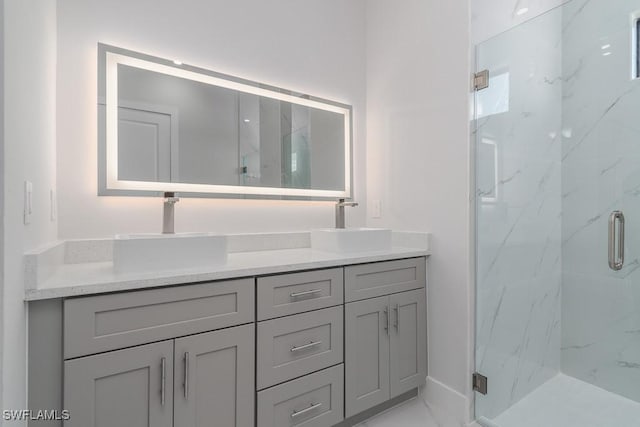 bathroom featuring vanity and walk in shower