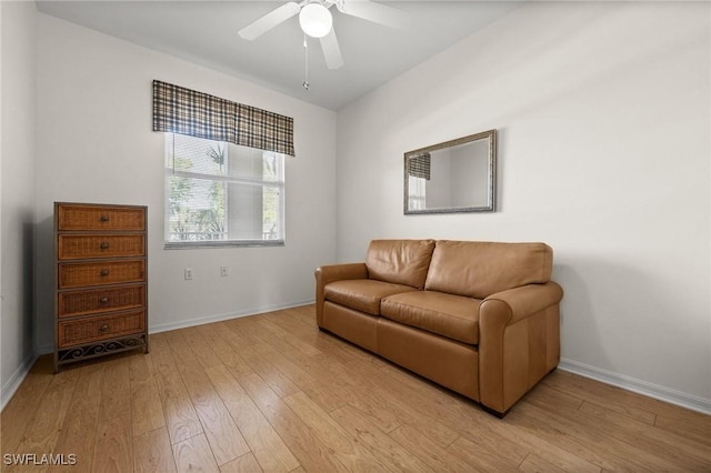 sitting room featuring light hardwood / wood-style flooring and ceiling fan