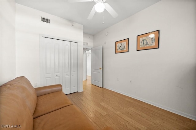 unfurnished room featuring ceiling fan and light hardwood / wood-style floors