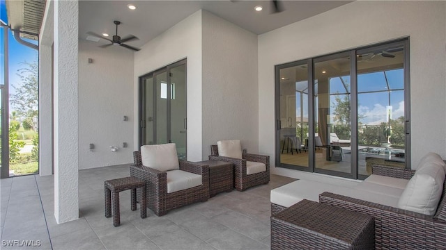 view of patio / terrace with ceiling fan and outdoor lounge area