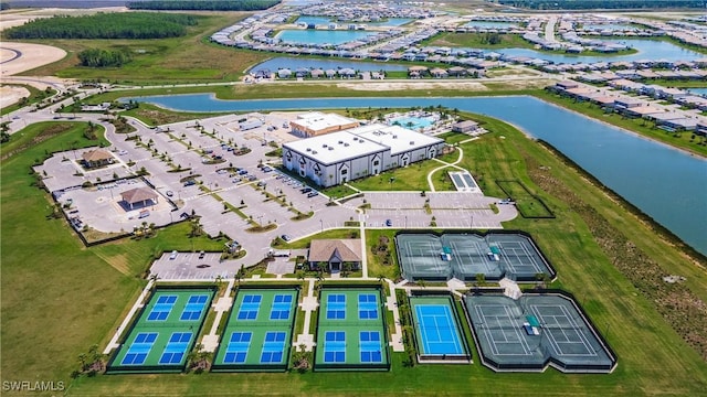 bird's eye view with a water view