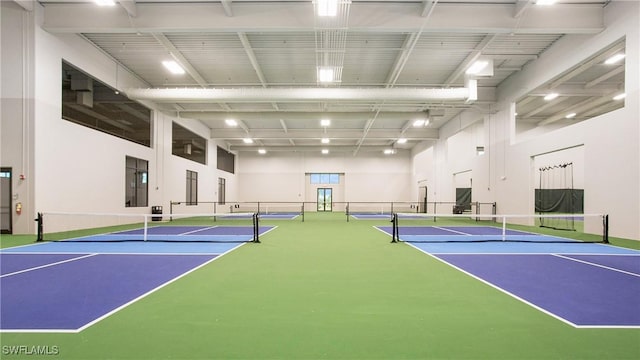 view of tennis court with community basketball court