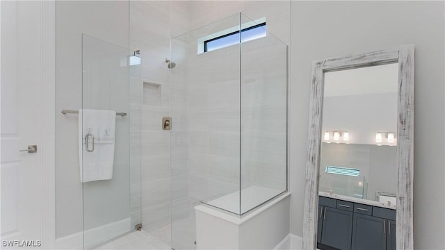 full bathroom with vanity and a walk in shower