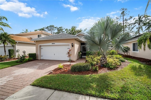 view of front of property with a garage