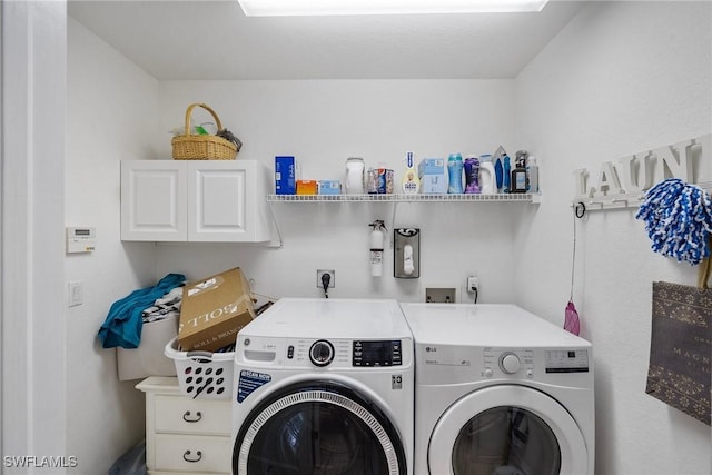 laundry area featuring washer and dryer