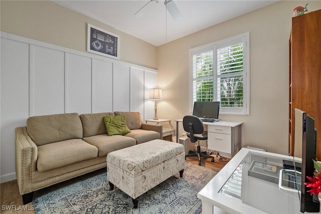 office area with ceiling fan and wood-type flooring