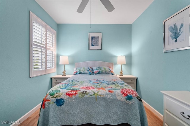 bedroom featuring ceiling fan and light wood-type flooring