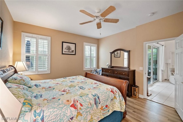 bedroom featuring access to exterior, ceiling fan, light hardwood / wood-style floors, and multiple windows