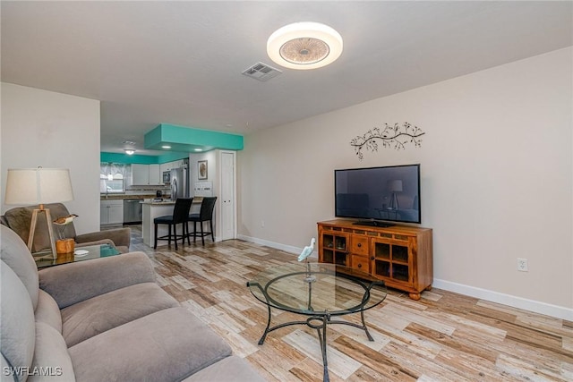 living room featuring light hardwood / wood-style floors